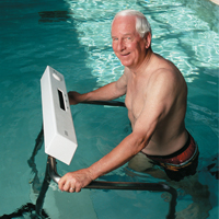 elderly man exercising in pool