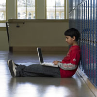Middle school kid on laptop