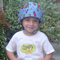 Child wearing high performance powder blue helmet