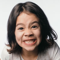 Boy grinning before dental visit