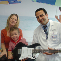 Raffi Tachdjian with young boy and his mom