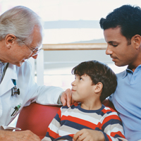 Doctor, dad and young son