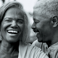 Man and woman laughing