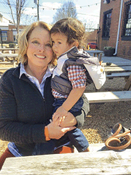 Trish Griffith holds grandson, Kai