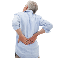 Person holding lower back in pain