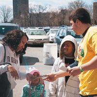 Individual distributes a passport to guests in NYC