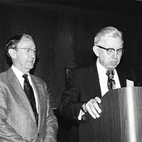 Harold Roberts, MD and Kenneth Brinkhous, MD at podium