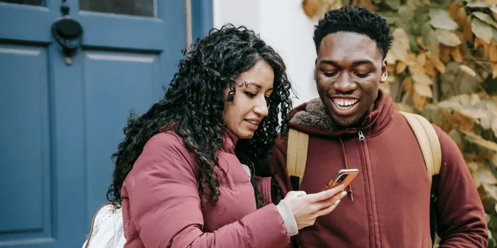 People looking at phone