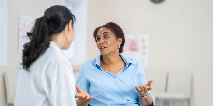 Doctor talking to patient