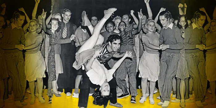 Vintage picture of a group of people dancing.
