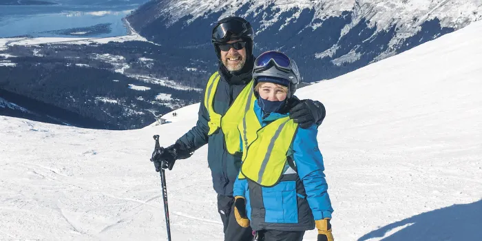 Matt Findley and his son Will on the ski slope in Anchorage, Alaska.