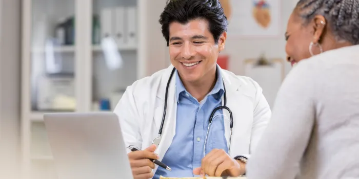 Doctor talking to patient