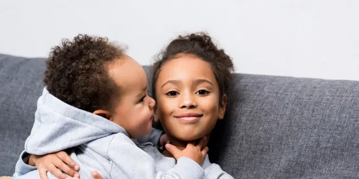 two children hugging