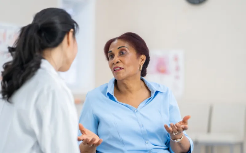 Doctor talking to patient