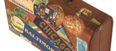 Suitcase with Chicago sticker