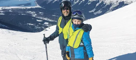 Matt Findley and his son Will on the ski slope in Anchorage, Alaska.
