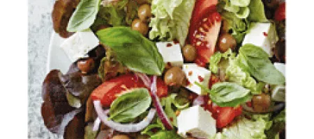 Salad with lettuce, tomatoes, olives and cheese