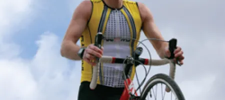 Man biking in triathlon